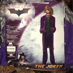 Joker costume from the Dark Knight. Worn for an hour. Includes wig.